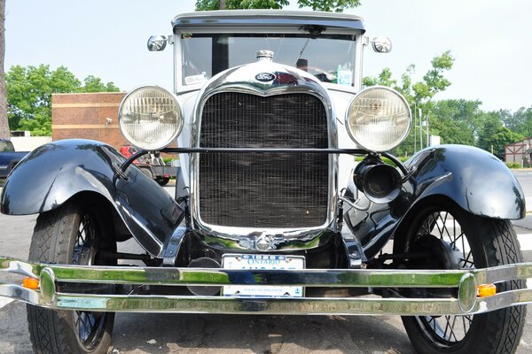 Classic Ford front on the background of nature