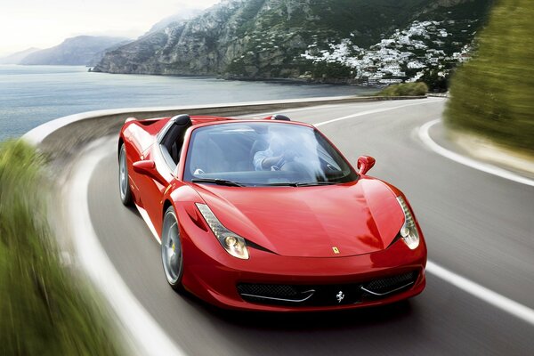 Ferrari rouge sur la route de campagne