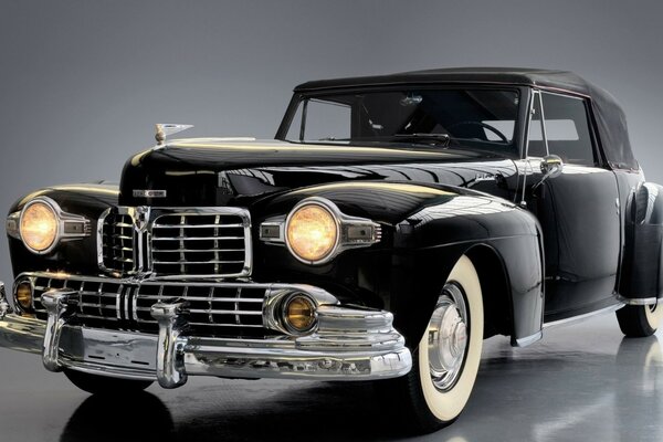 Retro Ford Lincoln Black with headlights on