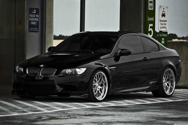 BMW M3 black in the parking lot