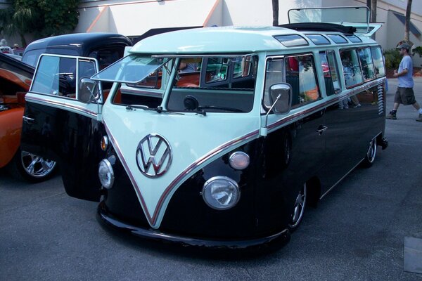 An old Volkswagen minibus in the parking lot