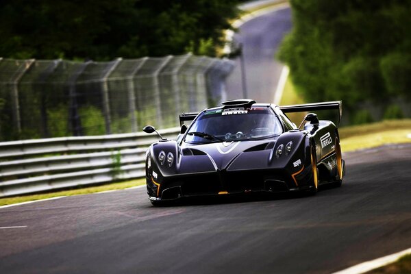 Dark grey pagani probe on the track