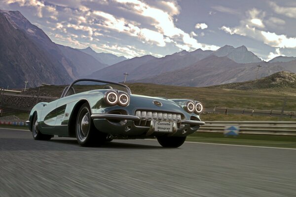 Coche retro en un hermoso fondo de montaña