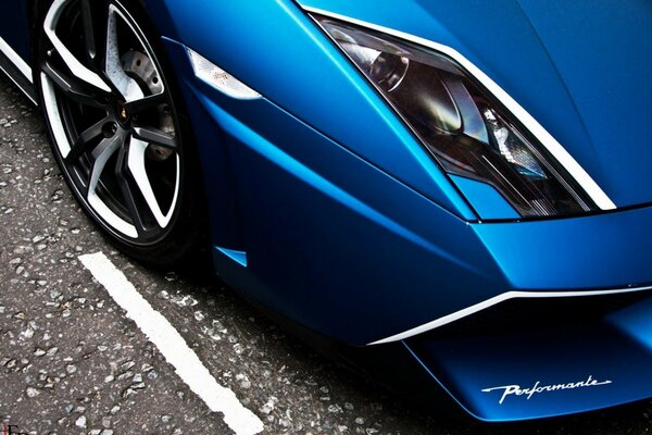 Blue Lamborghini. Wing. Large