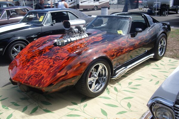 Beautiful corvette with fire on the hood