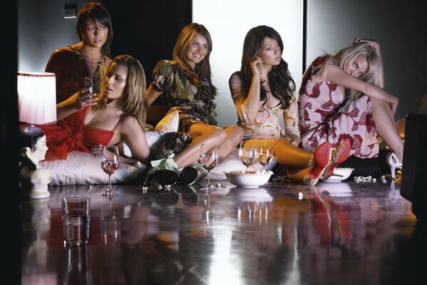 A fun bachelorette party with alcohol on the floor