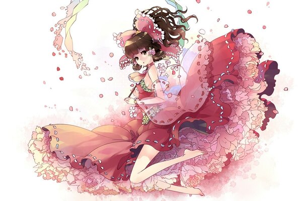 A girl in a lush dress with petals