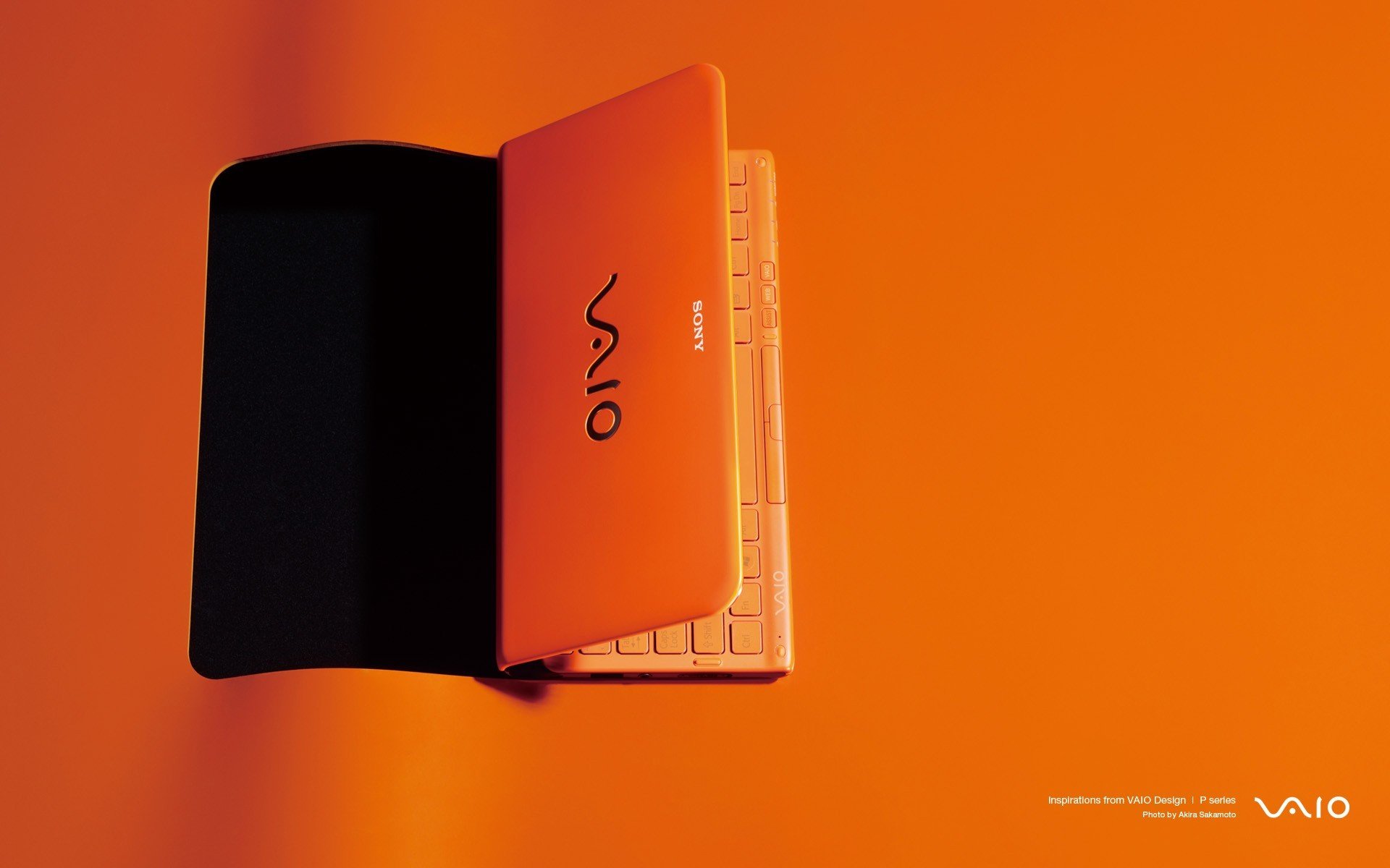 fond orange ordinateur portable orange sony