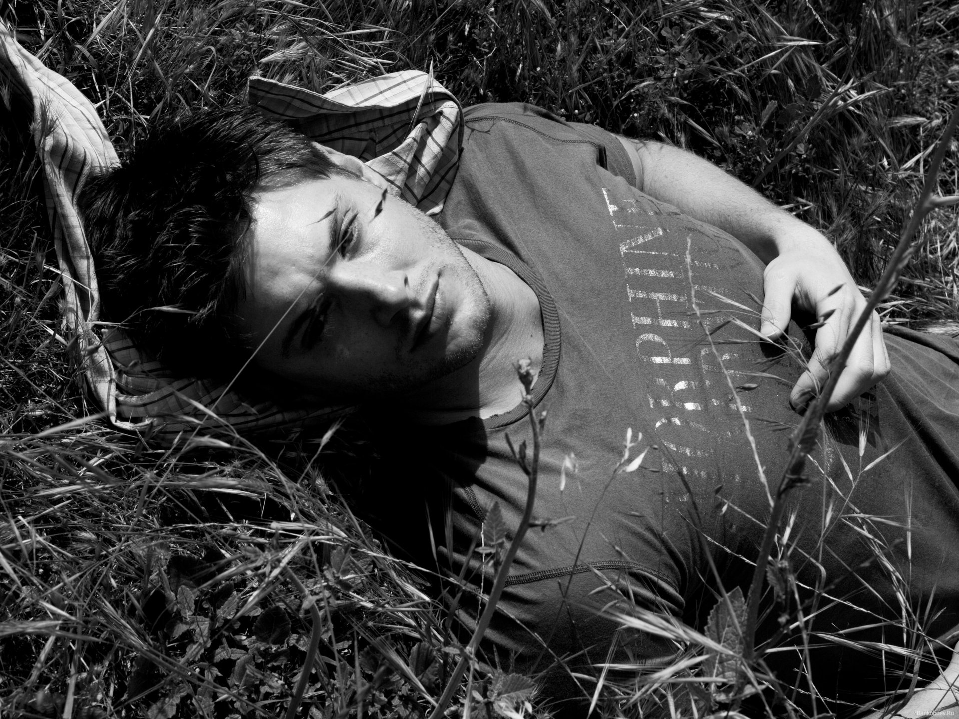 the dark-haired guy summer grass brooding sexy handsome b-b reverie face black and white