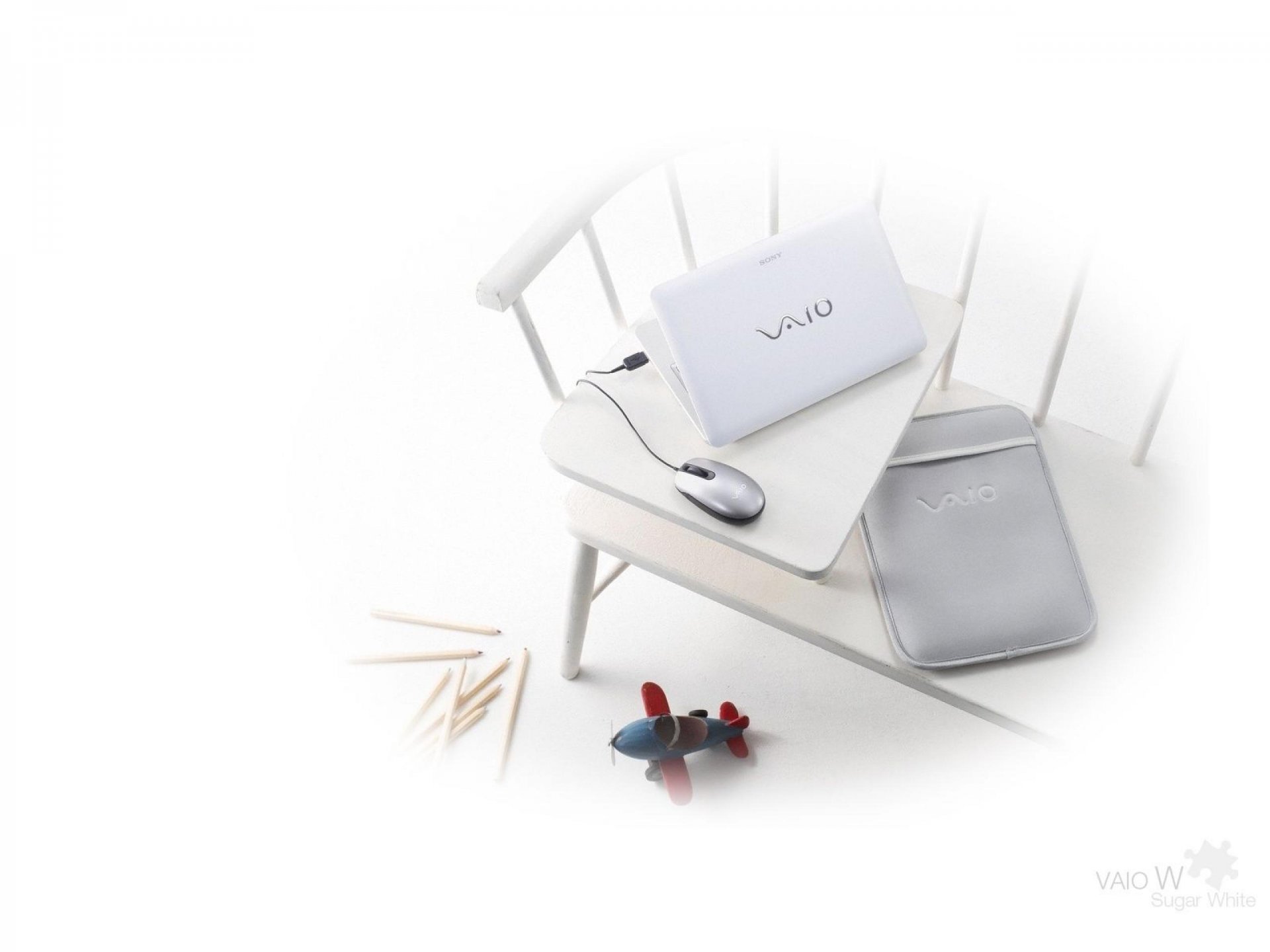 ony vaio notebook mouse toys bench white background