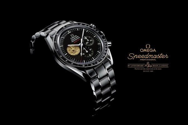 Omega watches photographed on a dark background