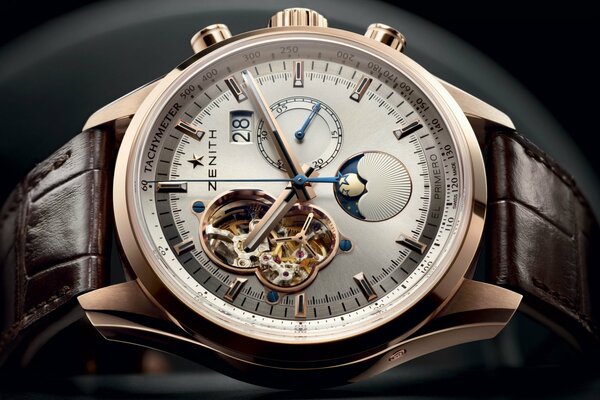 Luxury men s watches that have a mechanism visible through the window
