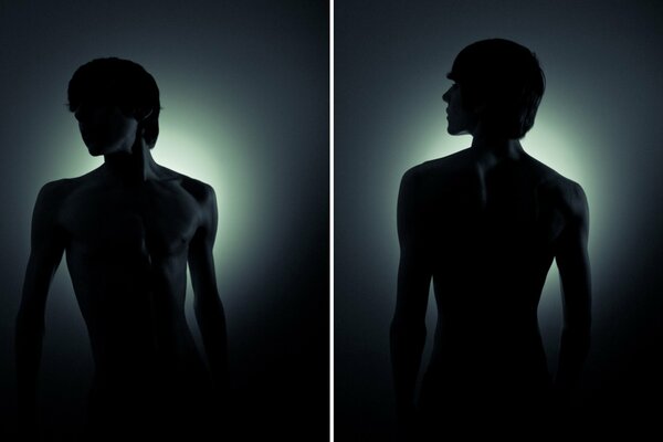 Silhouette of a young guy on a dark background