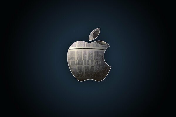 Логотип Apple. Металлическое яблоко на черном фоне