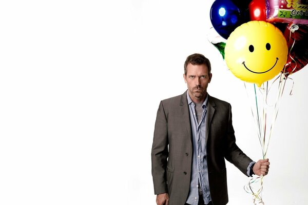 Getötetes Gesicht von Dr. house Filmschauspieler mit Luftballons