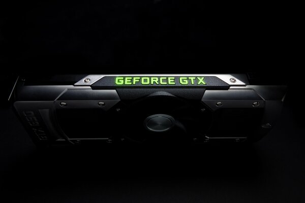 Gray and black graphics card on a black background