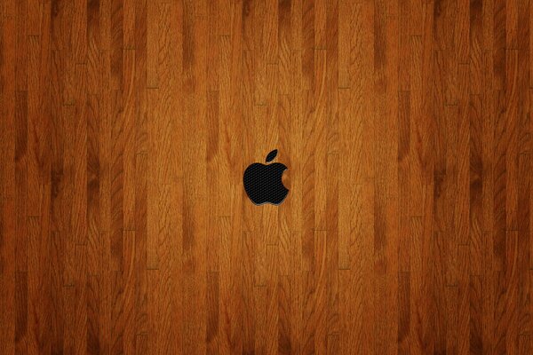 Apple emblem on a wooden background