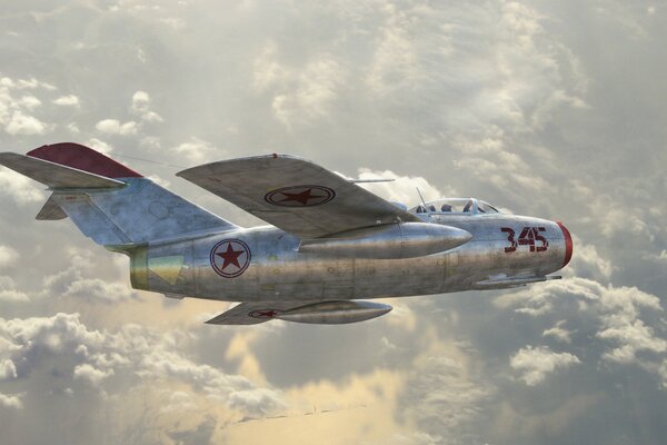 Avion de chasse soviétique vole dans les nuages