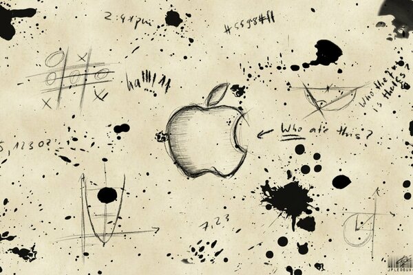 Логотип яблока нарисованный на бумаге с кляксами