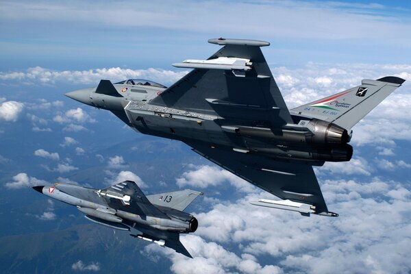 Military aircraft flying over debris