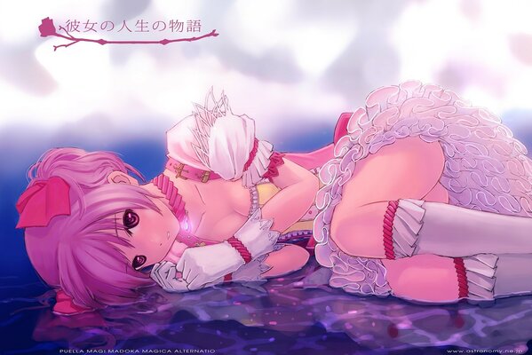 A pink girl in gloves is lying on the floor curled up