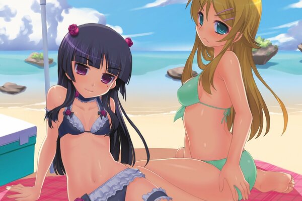 Two girlfriends in swimsuits relax on the beach