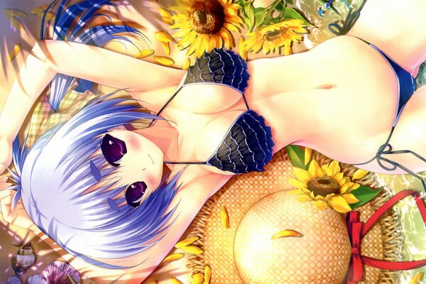 A girl with lilac hair is lying on a bedspread with sunflowers in a black bikini