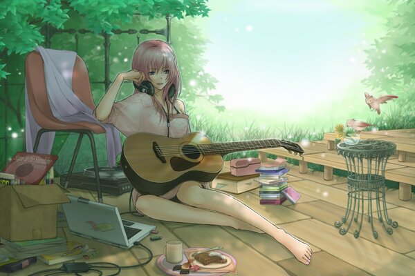 A girl with headphones and a guitar in her hands