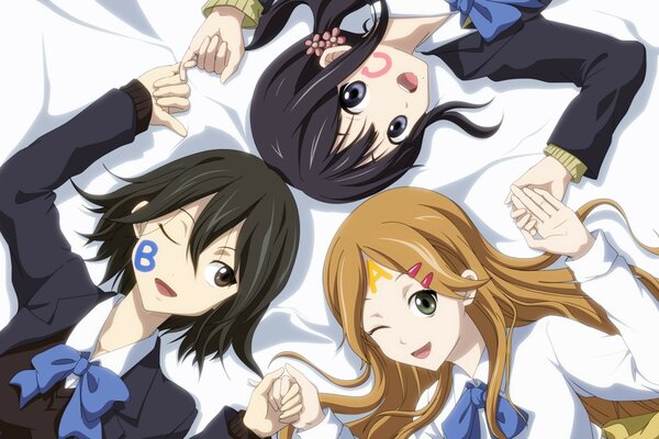 Three anime girls on the bed