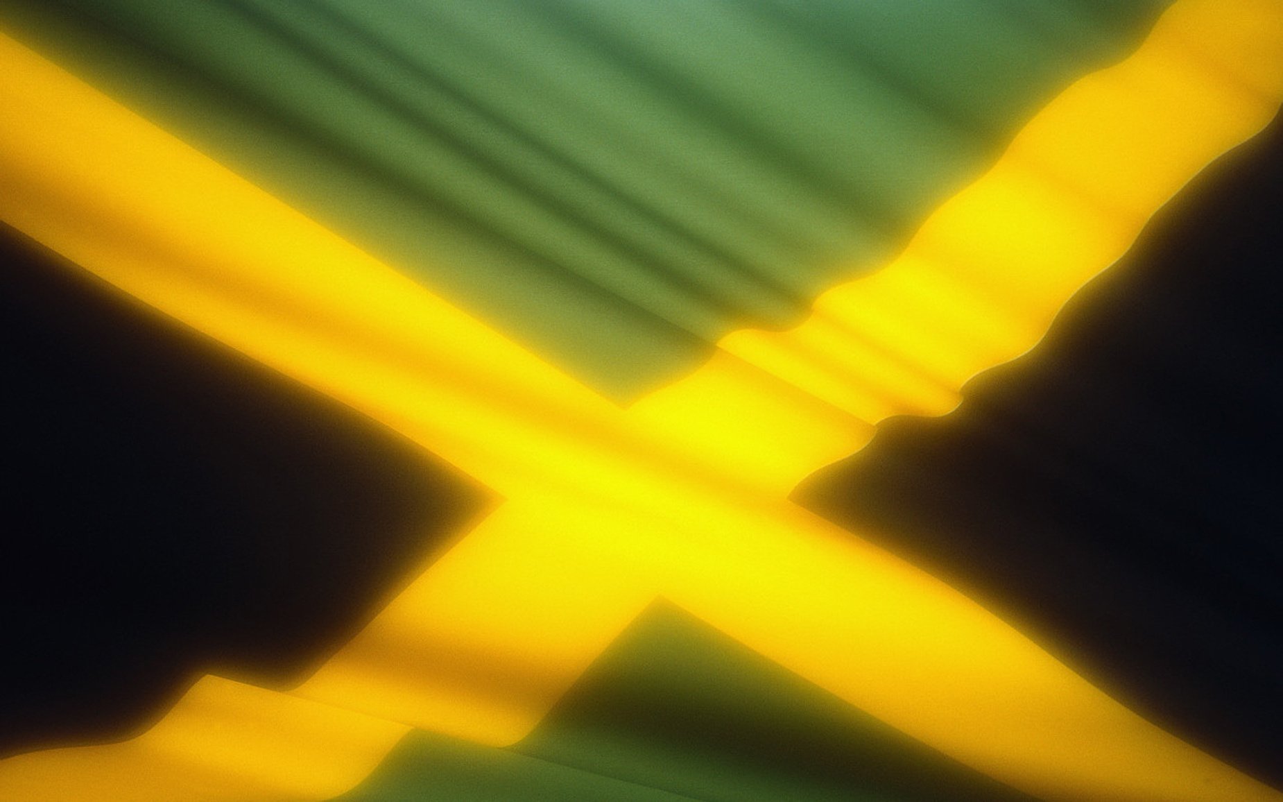 folds in the wind jamaica flag fabric flag