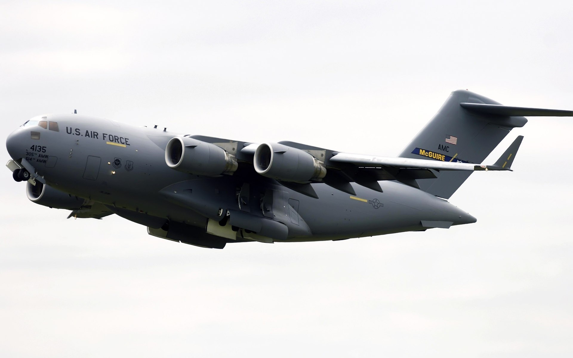 gris c-17 boeing avión blanco