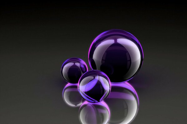 Purple glass balls on the table