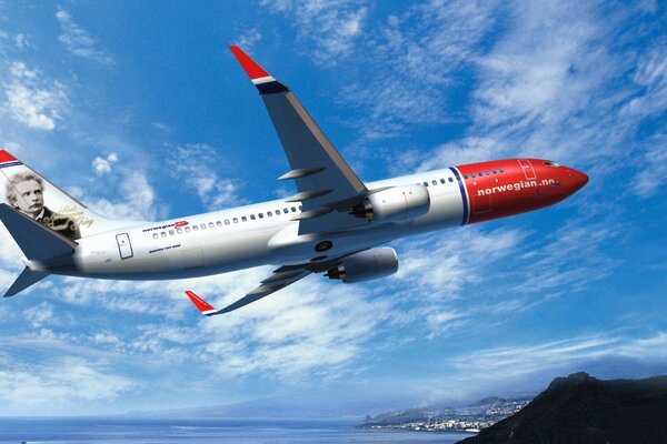 An airliner soaring into the beautiful blue sky