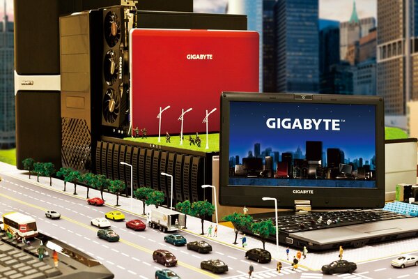 Реклама ноутбука gigabyte в миниатюре с машинами и людьми