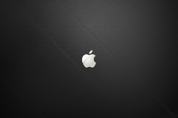 Apple logo on a black textured background