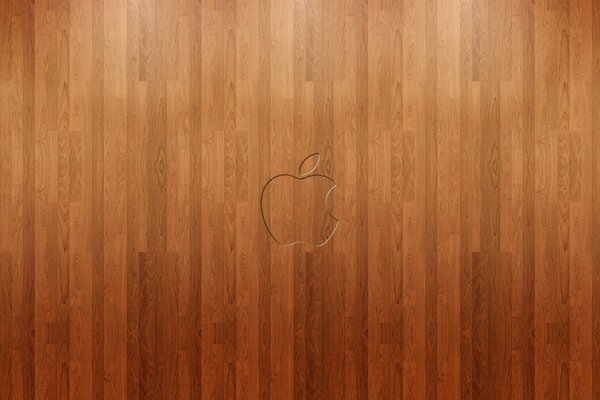 Logo iphone scolpito sul parquet