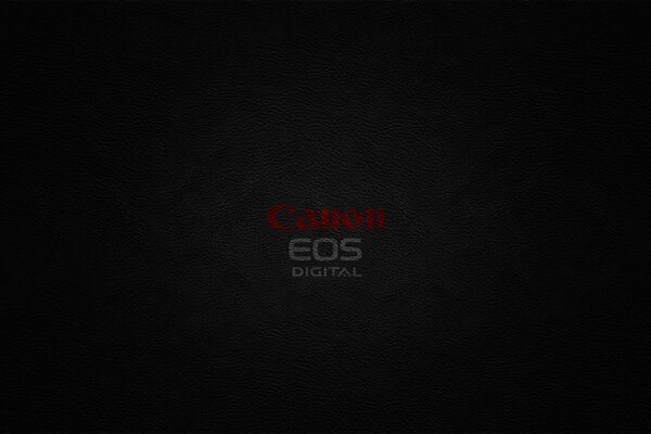 Dark desktop wallpaper with Canon logo