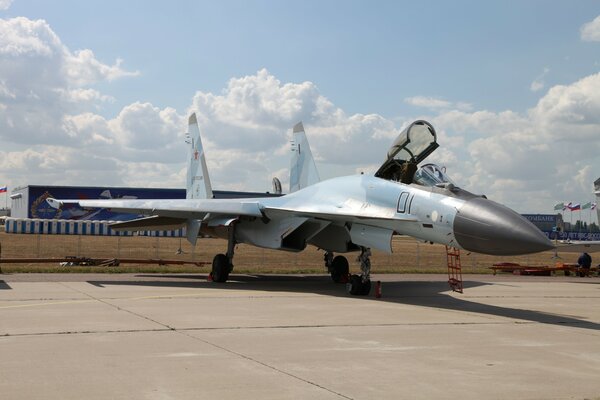 The Su-35 fighter jet is resting at the airfield