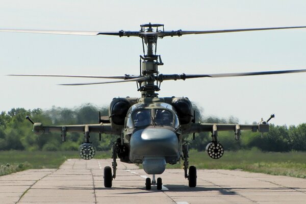 The ka-52 helicopter is preparing for takeoff