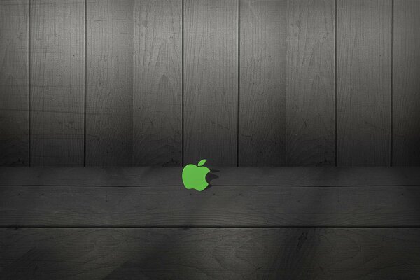 Green apple logo on the background of the boards