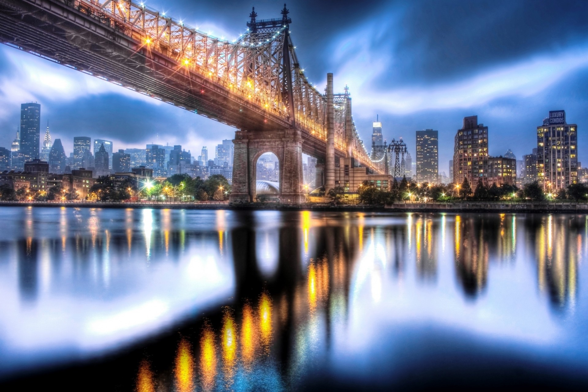 roosevelt island sky manhattan united states east river reflection town building house lights clouds skyscraper new york night queensboro bridge river