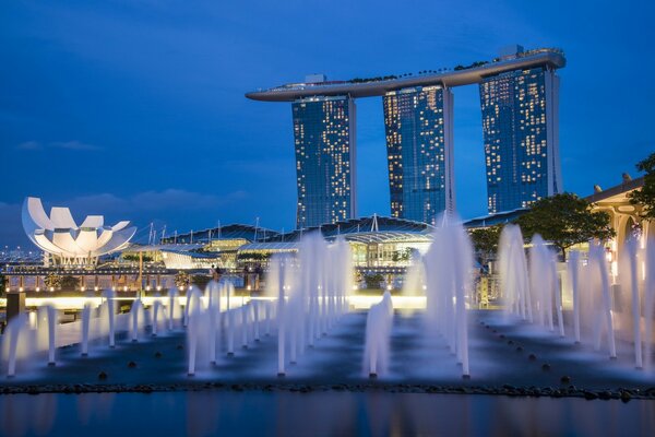 Fountains in Singapore on the background of a skyscraper