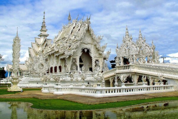 Thai temple on a cloudy sky background