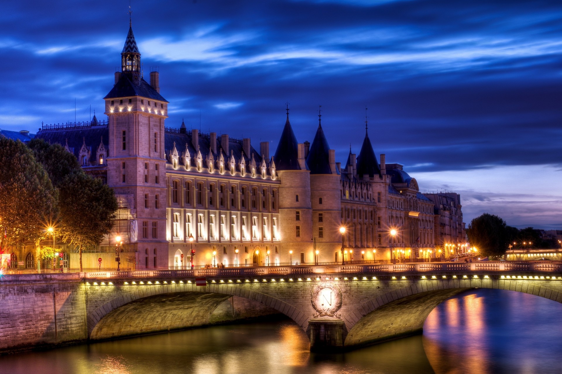 river lock bridge paris town night france qatar airways of the conciergerie palace of justice light