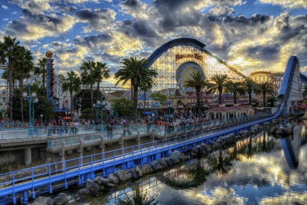 Disneyland in California. Palm trees. Clouds in reflection