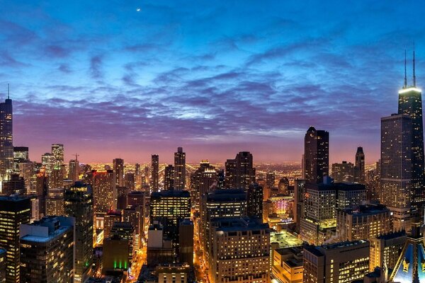 Panorama of city skyscrapers at night