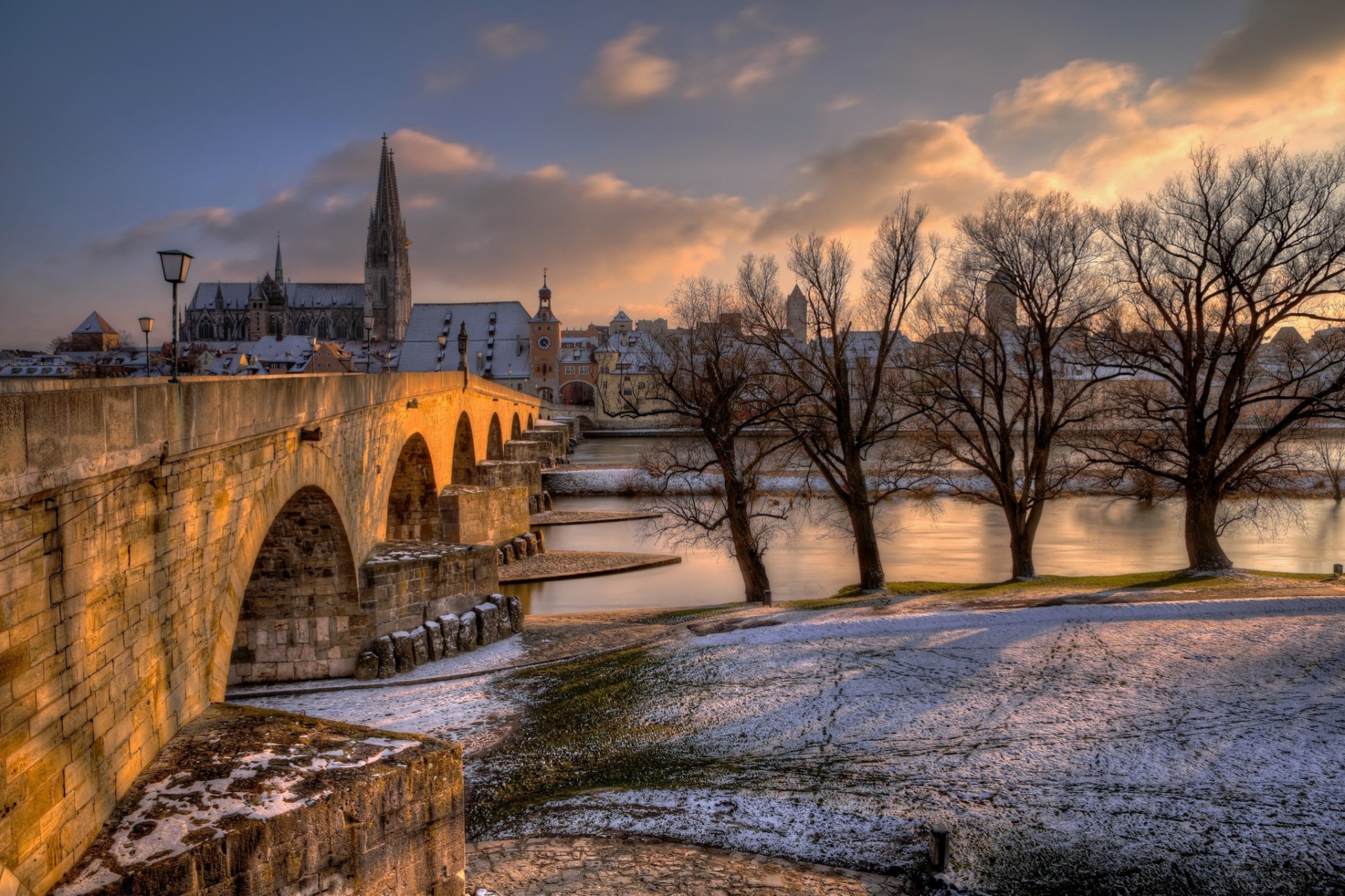 clouds sunset trees bridge shore city night bavaria germany regensburg repair