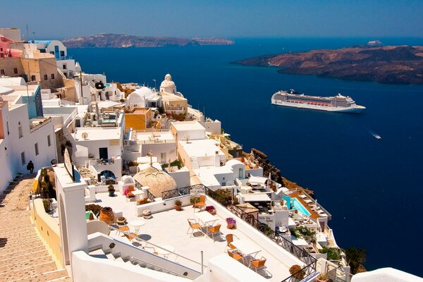 The white houses of Santorini. View from the mountain to the sea