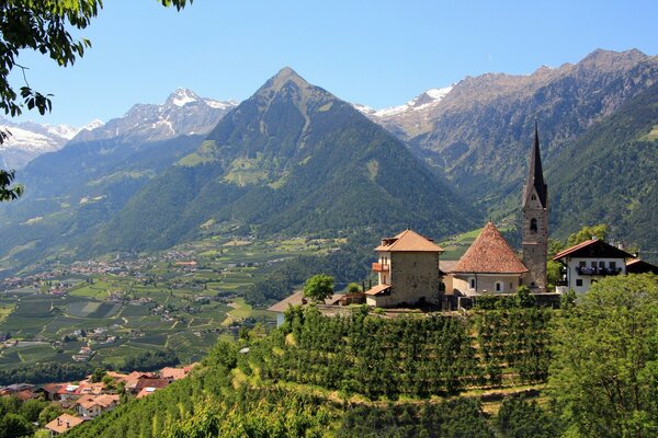 Italy ponorama of the southern Triol church and valley