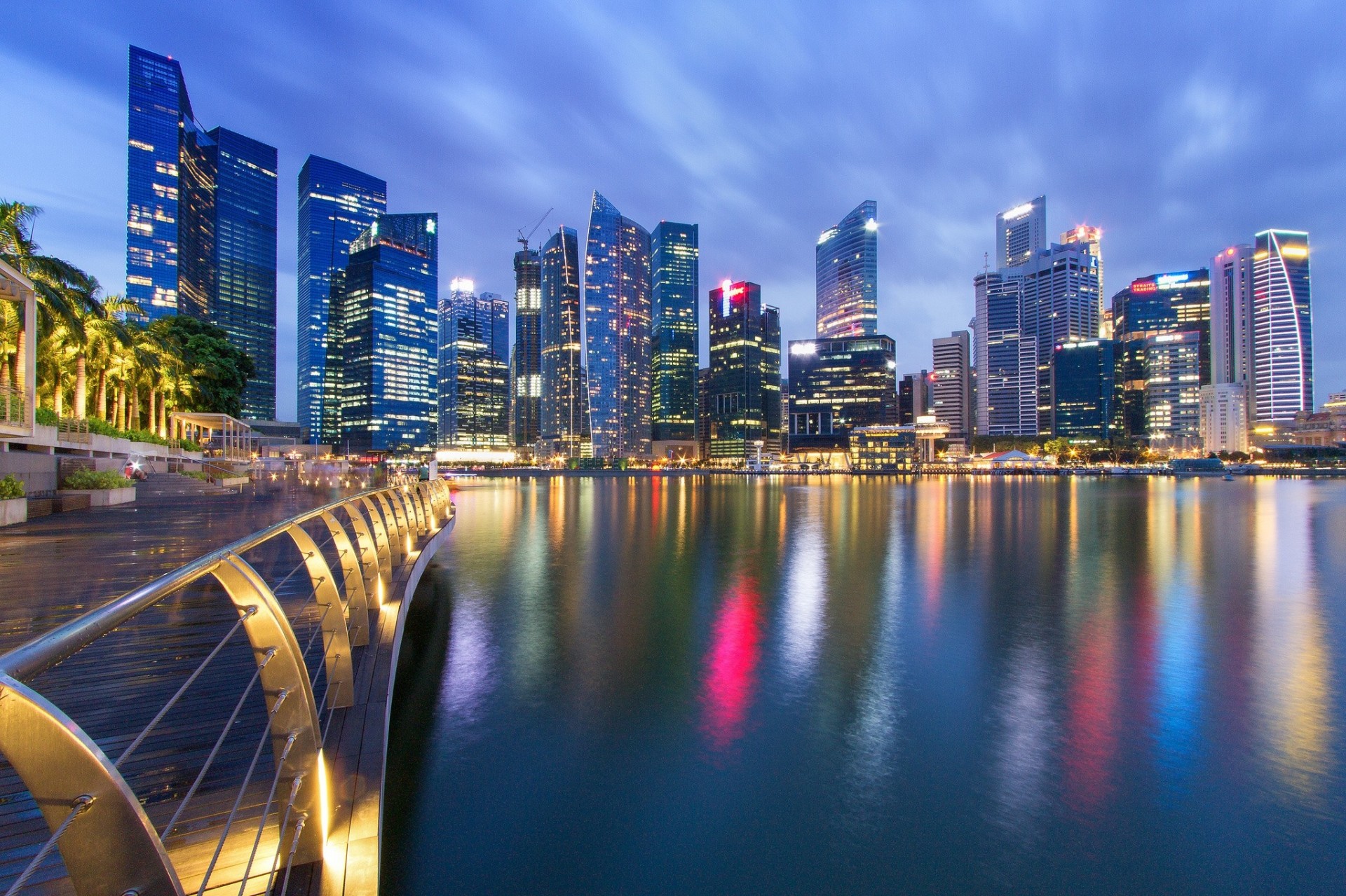 ciudad nocturna edificio singapur paseo marítimo